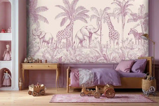 Pink safari animal mural with giraffes and elephants in tropical setting, styled in purple-themed bedroom with wooden toys on floor