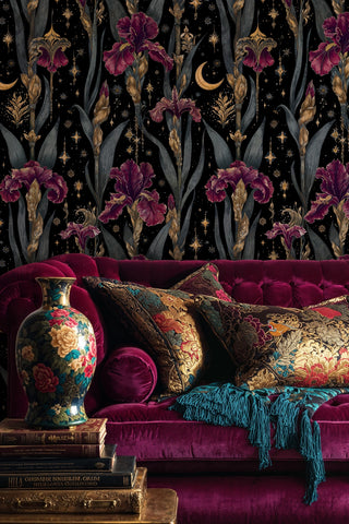 Purple iris and gold star wallpaper pattern displayed in maximalist living room with ornate decorative pillows