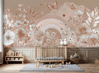 Rainbow botanical wall mural with butterflies and wildflowers in beige tones, shown in modern nursery with wooden crib