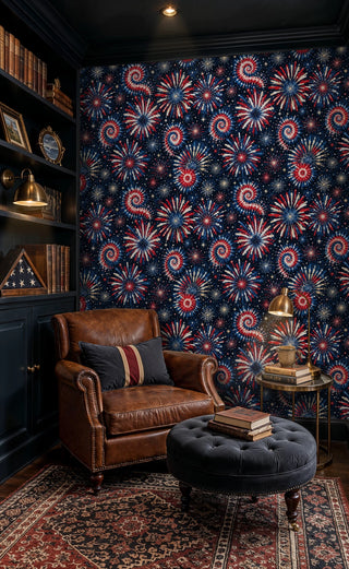 Red white blue fireworks wallpaper with gold stars, in a dark reading nook with leather armchair