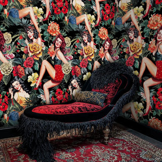 Retro pin-up floral wallpaper with red roses and tropical leaves in elegant bedroom with ornate bathtub