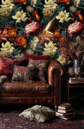 Rich botanical wallpaper featuring dramatic florals in luxurious living room with chesterfield sofa
