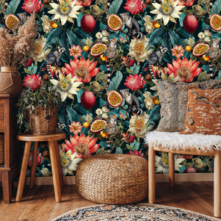 Ring-tailed lemur botanical wallpaper featuring vibrant florals in a boho living room with woven basket