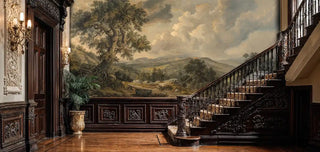 Romantic countryside wallpaper showing pastoral valley view, featured in grand entryway with ornate staircase