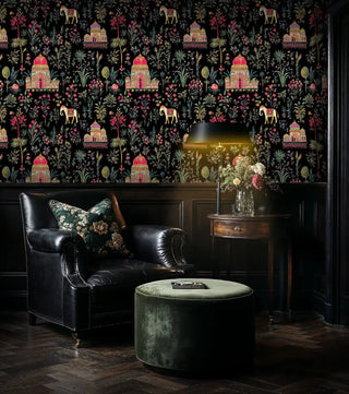 Royal Indian wallpaper featuring temples and elephants in sophisticated living room with green velvet ottoman