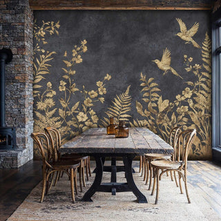 Rustic dining room showcasing gold botanical wallpaper with birds and ferns, featuring exposed brick fireplace