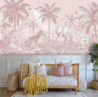 Safari animals wallpaper with giraffes, elephants, zebras in soft pink tones, displayed in cozy kids room with daybed