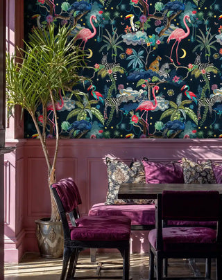 Safari night wallpaper showcasing exotic animals and lush plants, featured in dining room with purple velvet chairs