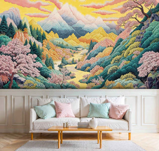 Scenic landscape wall mural showing golden mountains and forests in elegant living room with mint pillows