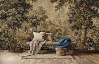 Scenic landscape wall mural with classical palatial architecture and rolling woodlands, shown in a minimalist bedroom with wooden bench
