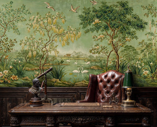 Scenic pastoral wall mural with swans and willows in classic study with leather chair and telescope