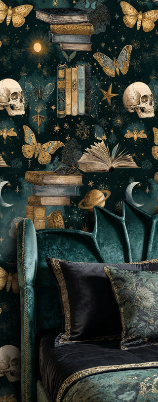 Scholarly celestial wallpaper featuring vintage books and moths in gold and teal, shown in luxurious sitting area with velvet chair