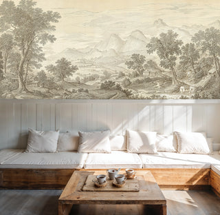Sepia pastoral wall mural showing countryside scene, featured in modern living room with built-in seating