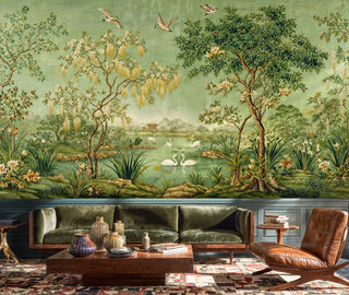 Serene swan lake wall mural with lush botanicals in modern living room with olive green sofa