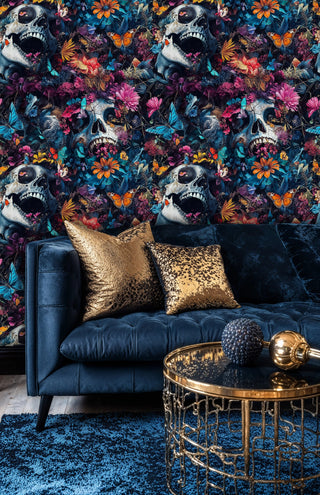 Skull and flower wallpaper with teal butterflies shown in modern living room with gold accent table