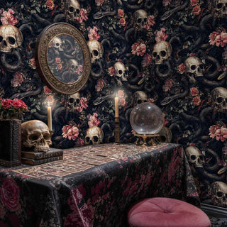 Skull serpent wallpaper with pink roses shown in gothic room with ornate mirror and crystal ball