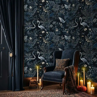Sophisticated bird and botanical wall mural in deep navy, featured in a cozy reading nook with candlelight ambiance