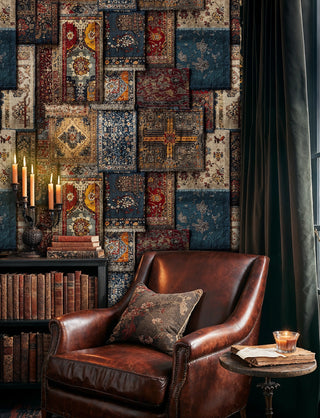 sophisticated vintage carpet wallpaper in rich colors, displayed in library setting with leather armchair