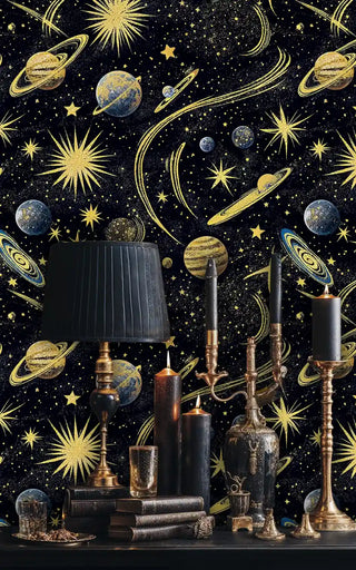 Space theme wallpaper with golden cosmic elements, styled in vintage study with brass candlesticks