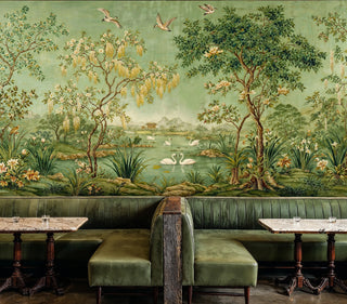 Swan lake botanical wall mural featuring birds and trees in upscale restaurant booth seating area