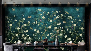 Teal chinoiserie wall mural with white flowers, shown in modern dining space with recessed lighting