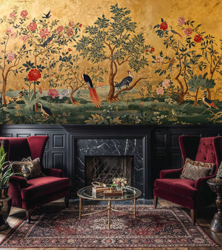 Traditional bird and flower wallpaper on gold background, showcased in sophisticated living room with fireplace