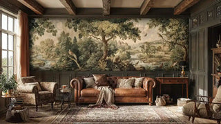 Traditional countryside wall mural with trees and water, displayed in sophisticated study with leather chesterfield sofa