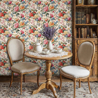 Traditional floral wallpaper with peonies and wildflowers in classic study with round tea table