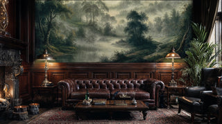 Tranquil forest scene wallpaper showing morning mist through trees in green and beige, featured in sophisticated lounge with ornate fireplace