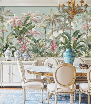 Tropical botanical wall mural with detailed palm leaves in elegant dining room with blue and white porcelain
