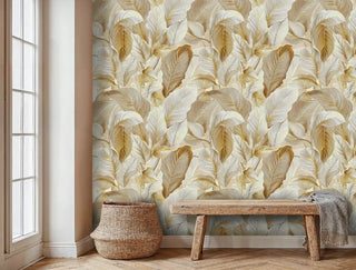 Tropical botanical wallpaper featuring oversized golden leaves, shown in minimalist entryway with woven basket