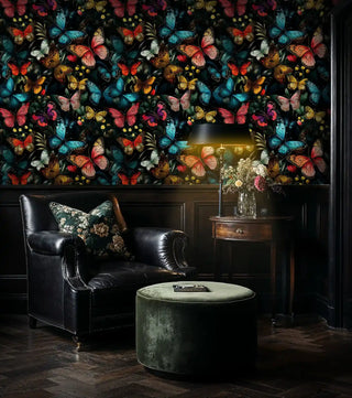 Tropical butterfly garden wallpaper with vibrant butterflies in sophisticated living room with black leather chair