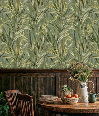 Tropical leaf wallpaper with golden details in rustic dining space with Windsor chair