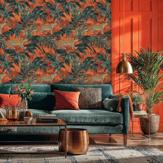 Tropical leopard wallpaper featuring spotted cats among emerald palms, shown in modern living room with teal sofa