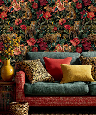 Tropical leopard wallpaper with hibiscus flowers and parrots on black background, displayed in living room