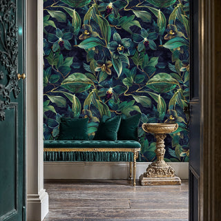 Tropical orchid wallpaper in navy and emerald tones, in sophisticated entryway with tufted velvet bench