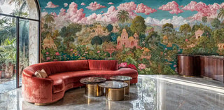 Tropical palace wallpaper with architectural details and florals behind curved orange sectional sofa
