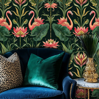Tropical paradise wallpaper with flamingos and lotus blooms, styled in elegant room with navy velvet sofa