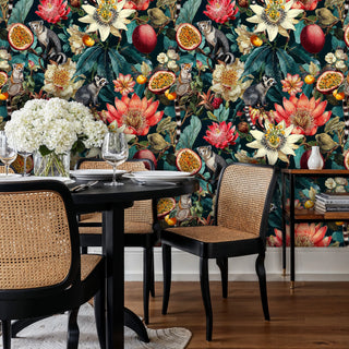 Tropical paradise wallpaper with lemurs and exotic fruits shown in an elegant dining room with black table
