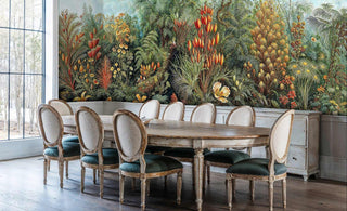 Tropical paradise wallpaper with lush botanicals in formal dining room with antique oval dining table
