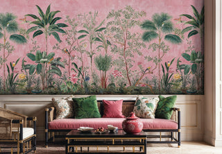 Tropical paradise wallpaper with palm fronds and exotic birds on coral background in elegant living room with pink velvet seating