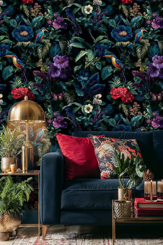 Tropical paradise wallpaper with vibrant birds and blooms in sophisticated living room with brass floor lamp