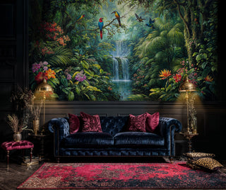 Tropical waterfall and parrot wall mural in dramatic dark interior with navy chesterfield sofa and brass lighting