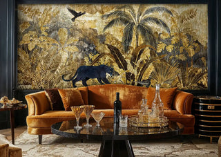 Tropical wildlife wallpaper with golden palms and panther shown in modern lounge with velvet sofa and cocktail glasses
