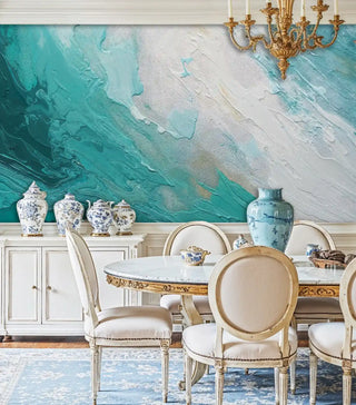 Turquoise abstract wave wallpaper with textured paint effect, shown in elegant dining room with gold chandelier