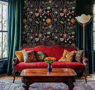 Vibrant cosmic wallpaper featuring mystical sun and heart dots, displayed in elegant room with red Victorian sofa