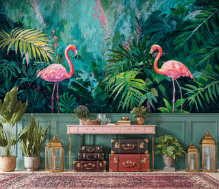 Vibrant flamingo wall mural with turquoise background and palm leaves, displayed in vintage room with leather suitcases