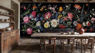 Vibrant floral wall mural with mixed blooms in rustic kitchen with wooden farmhouse table and pottery