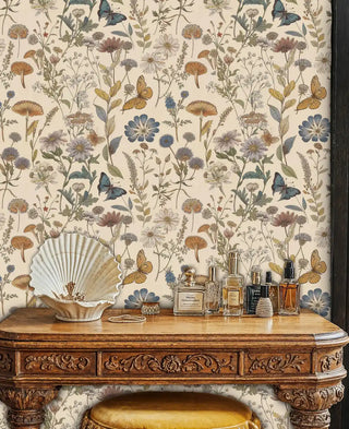 Vintage botanical wallpaper displaying flowers, mushrooms and butterflies, in elegant room with ornate vanity table