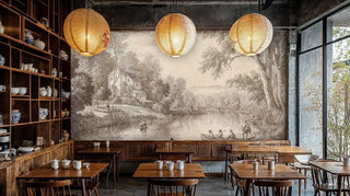 Vintage engraving style wall mural with pastoral scene, shown in cafe setting with wooden tables and lanterns